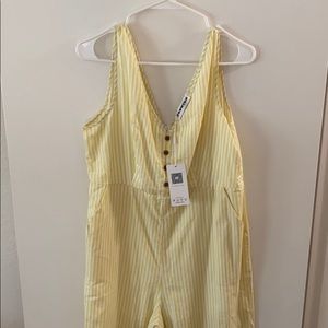 Yellow and white stripped pant romper.